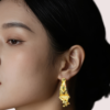 6ggl6fqiW6MnTAq0ljv54E5Lq48c3fDmaeI1ErLD Elegant Gold-Toned Ethnic Drop Earrings