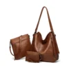 54249594451 dd6679a584 o d 1000x1000 1 Women's PU Leather Medium Shoulder Zipper Handbag (Brown)